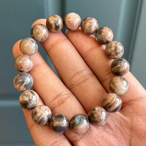 Black Skeletal Sunstone Crystal Bracelet 12mm